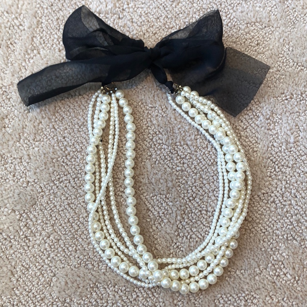 Faux pearl necklace with black ribbon
